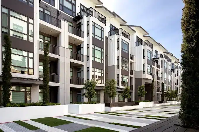 Hadley apartment buildings alongside paved paths and grass bands